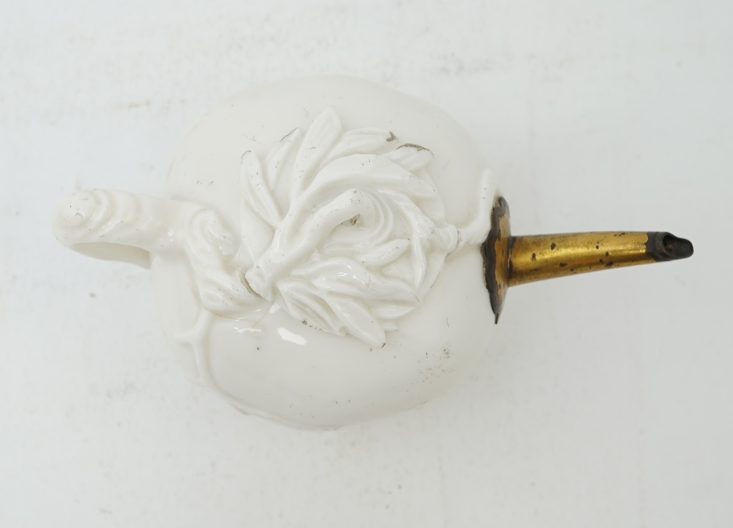A Chinese Dehua blanc-de-chine ‘pomegranate’ teapot, mid 17th century